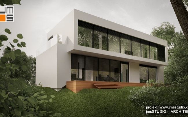 projekt dużej rezydencji z płaskim dachem i oknami aluminiowo drewnianymi w Krakowie