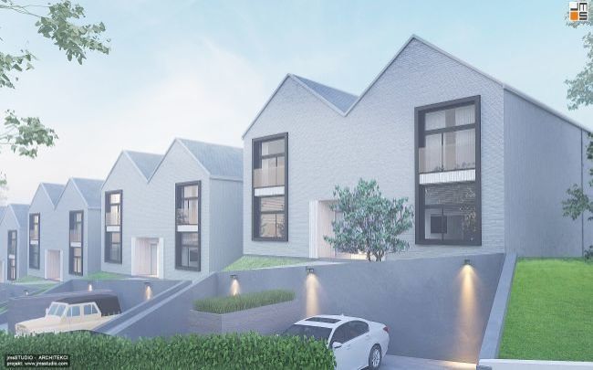 Elegancka elewacja z białej cegły z czarnymi akcentami to projekt nowoczesnego osiedla domów typu bliźniak pod Krakowem z prostymi bryłami i dachami dwuspadowymi na działce ze spadkiem