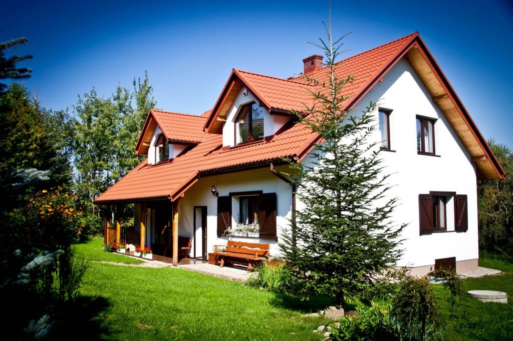 Architekt Kraków - Projekt przebudowy domu na działce ze spadkiem w górach - dom tradycyjny rustykalny - dom z werandą w siedlisku.