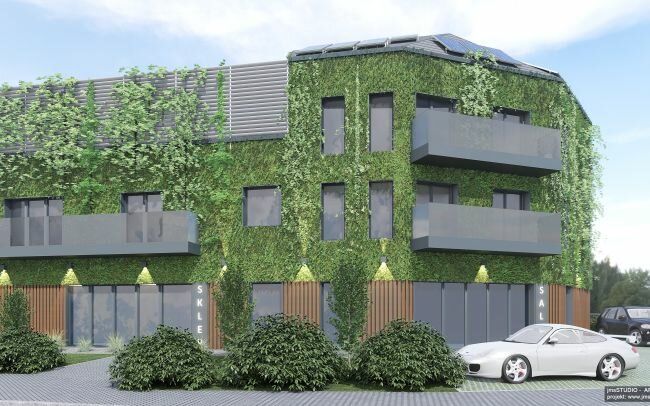 Projekt nowoczesnego eko budynku usługowo mieszkalnego z naturalną zieloną elewacją z roślin w centrum miasta
