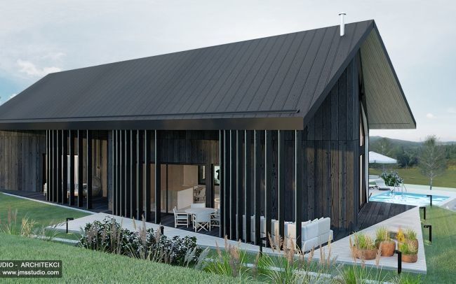 Projekt nowoczesnego domu na spadku w Bielsku stodoła z pomysłem na elewacja z  drewna palonego duża pergola i dach dwuspadowy asymetryczny